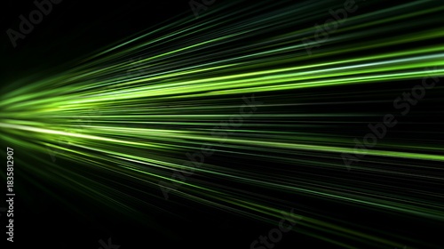 a close up of a neon light display with blurred green and yellow rays against a dark background, creating an abstract, energy like effect