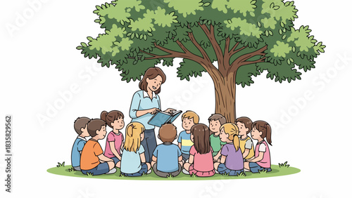 A teacher reading a book to a group of children sitting on grass under a large tree.