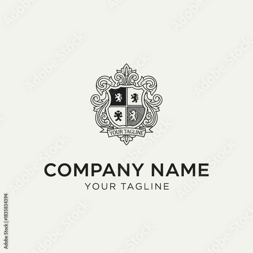 Elegant Heraldic Crest Logo with Lions and Ornate Shield.