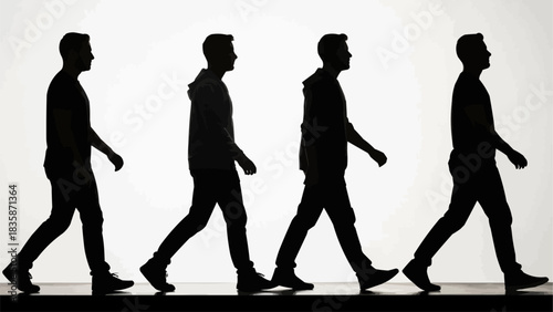 Silhouettes of four men walking in a row.