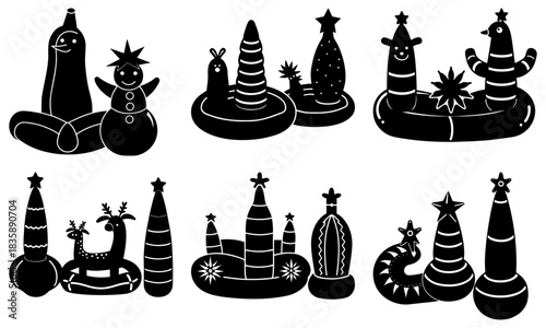 A collection of whimsical black and white inflatable figures including animals and abstract shapes