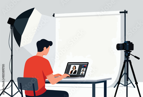 A person in a photography studio with a laptop video call, camera, lighting, and a white backdrop