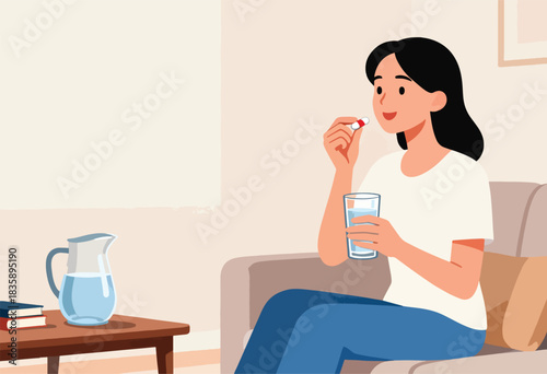 A woman prepares to take medicine with water, sitting on a sofa in a home setting
