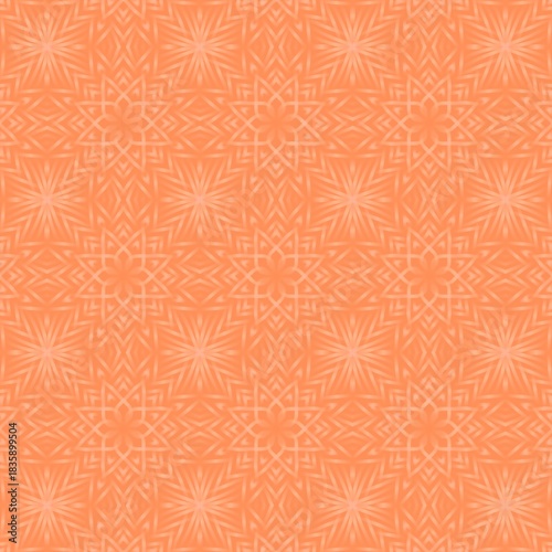The image features an orange kaleidoscope seamless pattern, an abstract symmetrical design that resembles a flower or a starburst created by the reflection and rotation of basic shapes. 