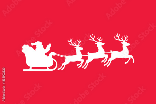 silhouette of santa on his sleigh with flying reindeer