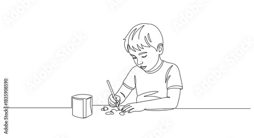 Line drawing of a young boy concentrating while drawing on a table with a pencil and paper, isolated on transparent background