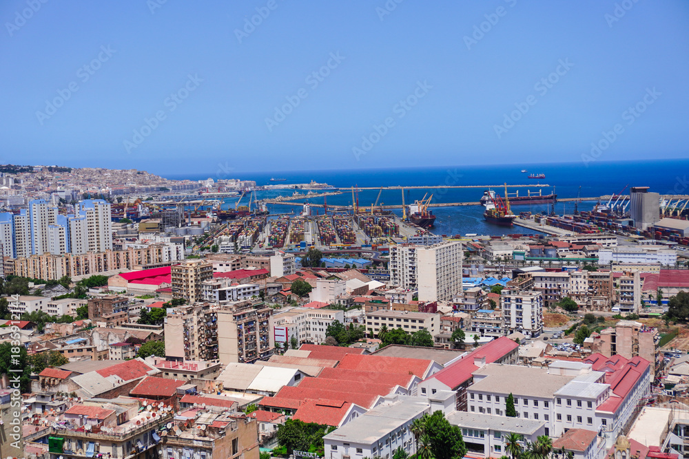 Fototapeta premium Alger the capital city of Algeria, North Africa, city centre of Algiers, the capital of Algeria, Landscape of Algiers city With port and mediterranean sea and white buildings, Arab Maghreb Africa.