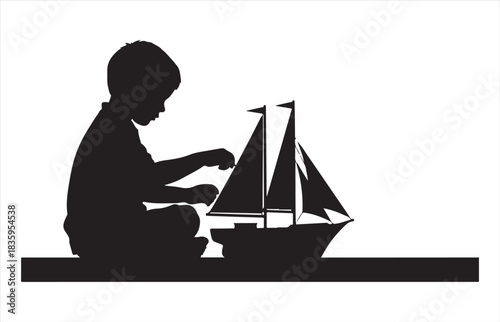 Silhouette of a young child sitting on the floor playing with a toy sailboat on a white background