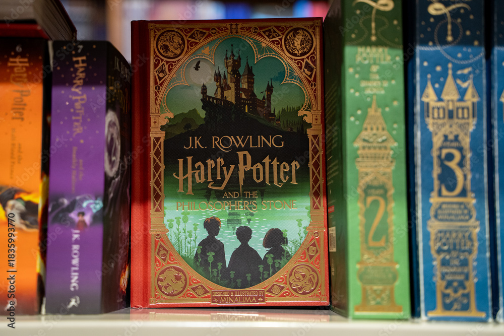 Obraz premium Close up of Harry Potter and the Philosopher's Stone illustrated edition. Toronto, Canada - December 3, 2025.