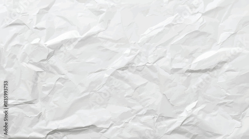 A close up view of intensely crumpled white paper showcasing texture and shadows