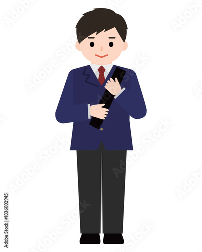 制服姿で卒業証書を抱える男の子