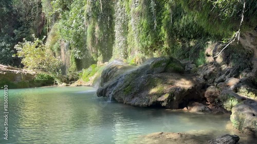 Waterfall lush greenery. High quality photo