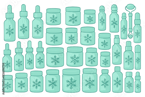 Collection of green jars and bottles with snowflake designs for cosmetic or craft use