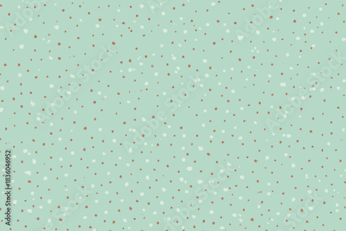 Colorful speckled pattern on a soft mint background with scattered dots for design inspiration