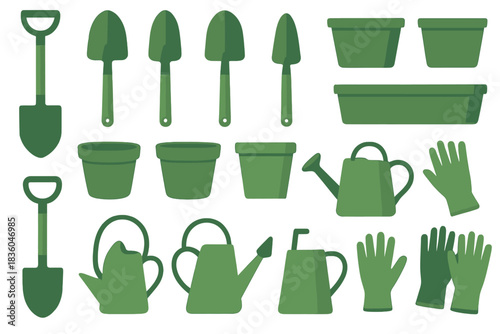 Gardening tools and supplies laid out in various green shades for an outdoor planting session