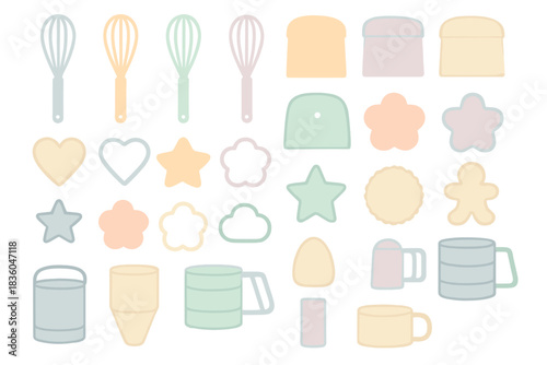 Colorful kitchen utensils and cookie shapes arranged in a playful pattern for baking activities