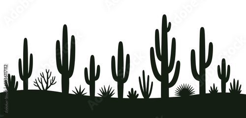 Dark desert silhouettes with cacti and sparse vegetation at twilight
