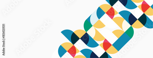 Abstract geometric shapes overlap, creating colorful pattern. White space dominates composition, offering clean aesthetic.