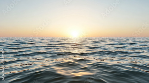 Fototapeta Naklejka Na Ścianę i Meble -  Gentle evening light over water calm sea horizon sunset glow