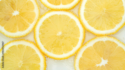 Fresh yellow lemon and soda.