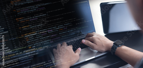 Software devloper coding javascript, using laptop computer, representing software development for coding, IT solutions, digital technology, web applications