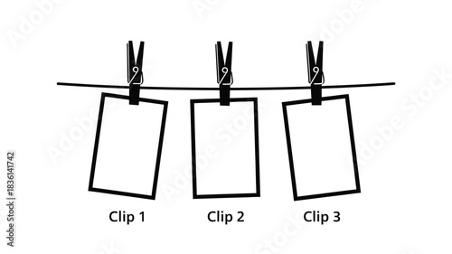 Three rectangular cards hanging from a line with clothespins
