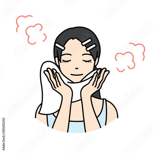 Woman steaming her face with a warm towel for pore care