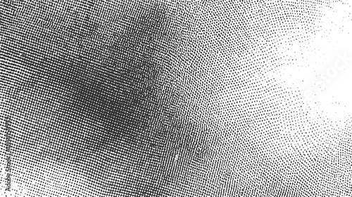 Black dots on white background forming a textured pattern with gradient density abstract