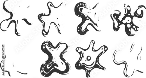 Eight abstract ink brush stroke shapes with organic fluid forms and splatters vector