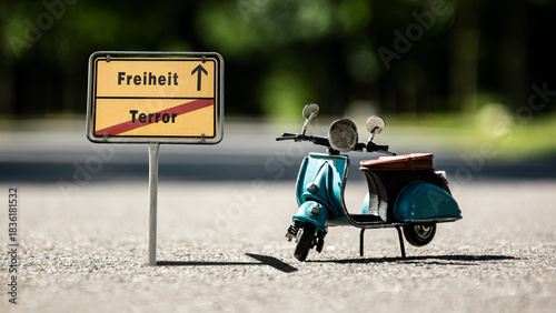 Foto Signposts the direct way to Freedom versus Terror