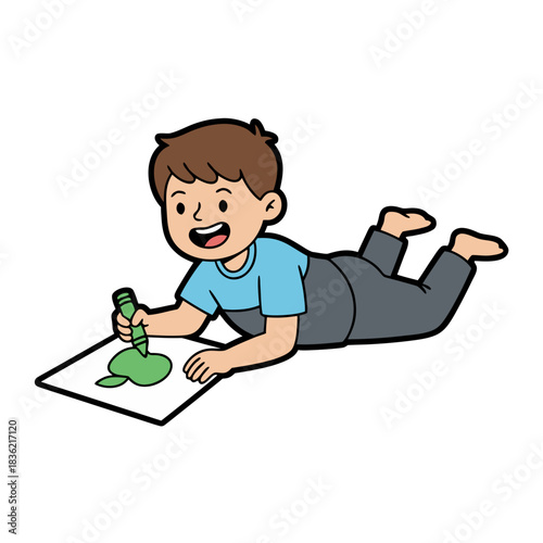 Boy with Brown Hair in a Blue T-shirt and Gray Pants Lying Down and Drawing with Green Paint on White Paper in a Studio
