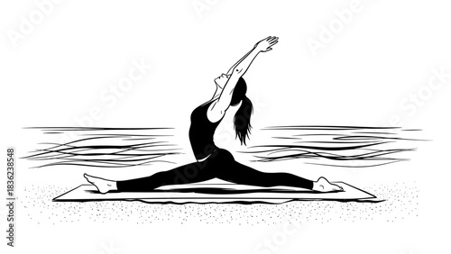Woman practicing yoga in a split stretch pose on a mat by the ocean