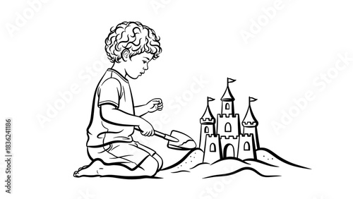 Young boy building a sandcastle on the beach with a shovel in black and white