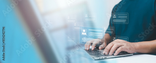 A person typing on a laptop with floating digital profile cards represents modern HR technology, online recruitment, data screening, and efficient candidate management in the Management, workplace.