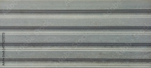 Gray metallic roll up door shutter, horizontal lines, industrial design