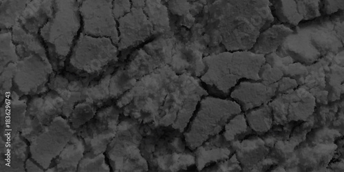 Black Dry Drought Land with Chaps as Natural Ground Background. Black dry earth background. asphalt in cracks texture / abstract background cracks on asphalt road.
