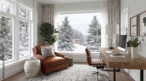 Cozy desk winter light concept. Cozy home office with large windows and winter scenery outside.