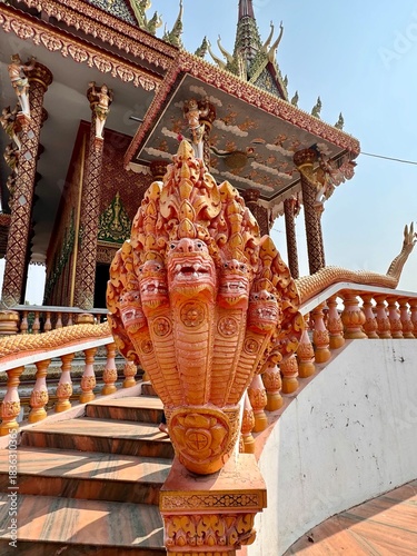 Sculpture of a Multi-Headed Naga Serpent at the entrance of a temple in Lumbini Nepal