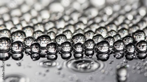 Prismatic Microbead Bokeh on Water — Macro Abstract 4K Stock Footage