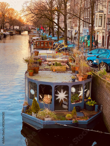Bild auf Leinwand residential canal boat in Amsterdam