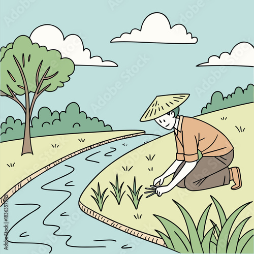 An Asian farmer in hat works in rice paddy field near a stream