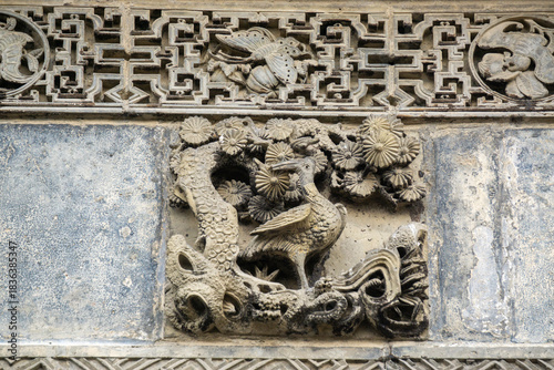 The exquisite brick carvings on the flower Theatre archway in Bozhou City, Anhui Province, China. The Flower Theatre was first built in the Qing Dynasty.