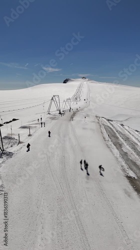 Aerial video of top of klein matterhorn and ski lift glacial
