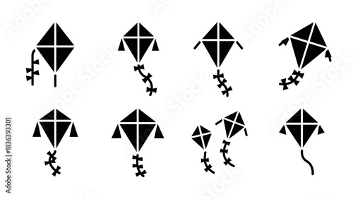 Silhouette kite icons set with flat design variations in black and white