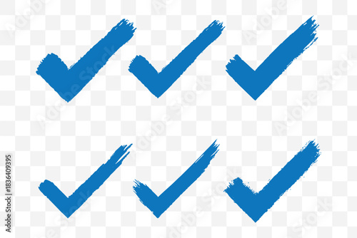 Set of check marks drawn with brush strokes. Approval symbol. Green check mark symbol on isolated background. Vector.