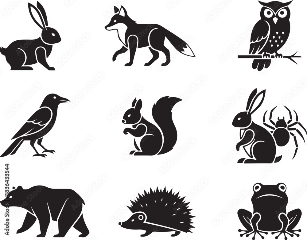 Fototapeta premium Set of nine black silhouette icons of forest and woodland animals Keywords: rabbit, fox, owl, crow, squirrel