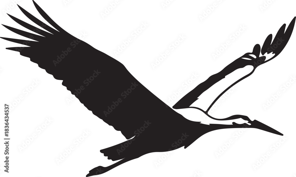 Fototapeta premium Black silhouette of a stork bird in flight with wings spread wide flying