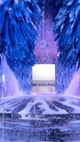 POV from Inside a Car Wash with Blue Brushes
