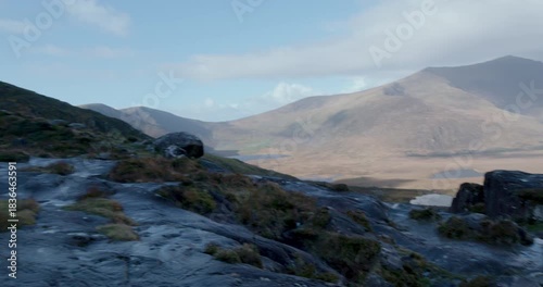 Exploring the Kerry region in Ireland with views of mountains, valleys, and winding roads