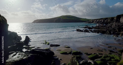 Explore the Kerry region of Ireland with waves, rocks, and hills to see